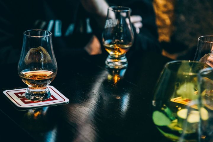 Glencairn glasses filled with single cask Scotch malt whisky during a private VIP tasting.