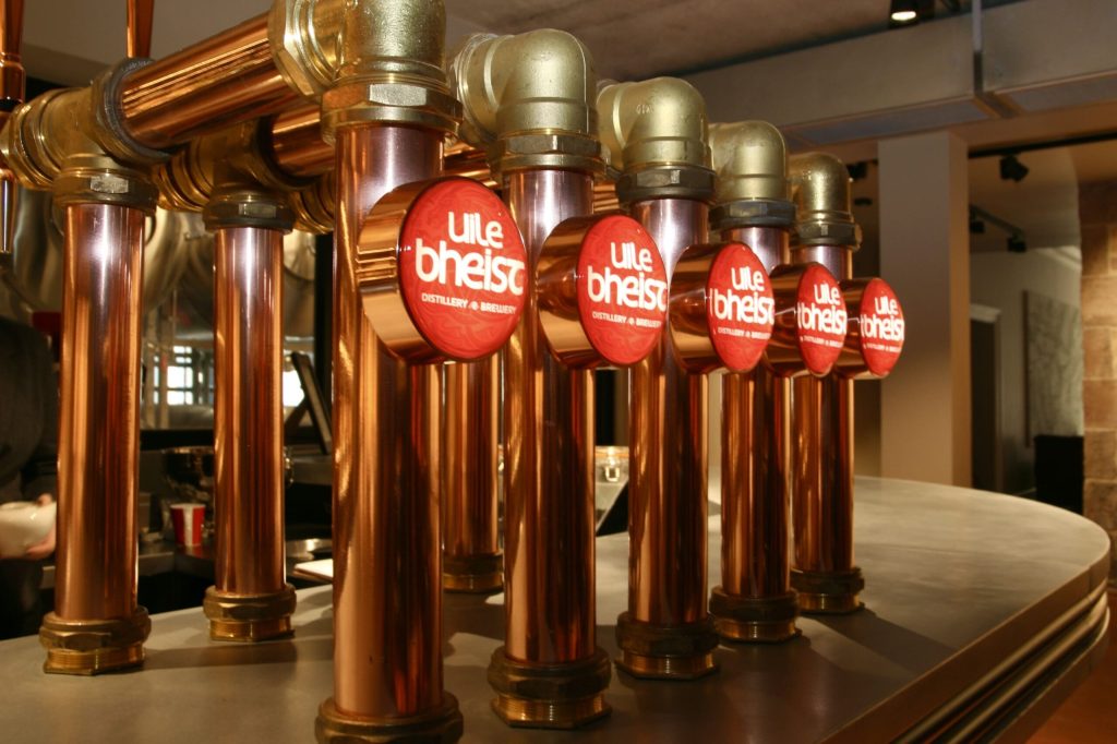 a group of glass bottles on a table