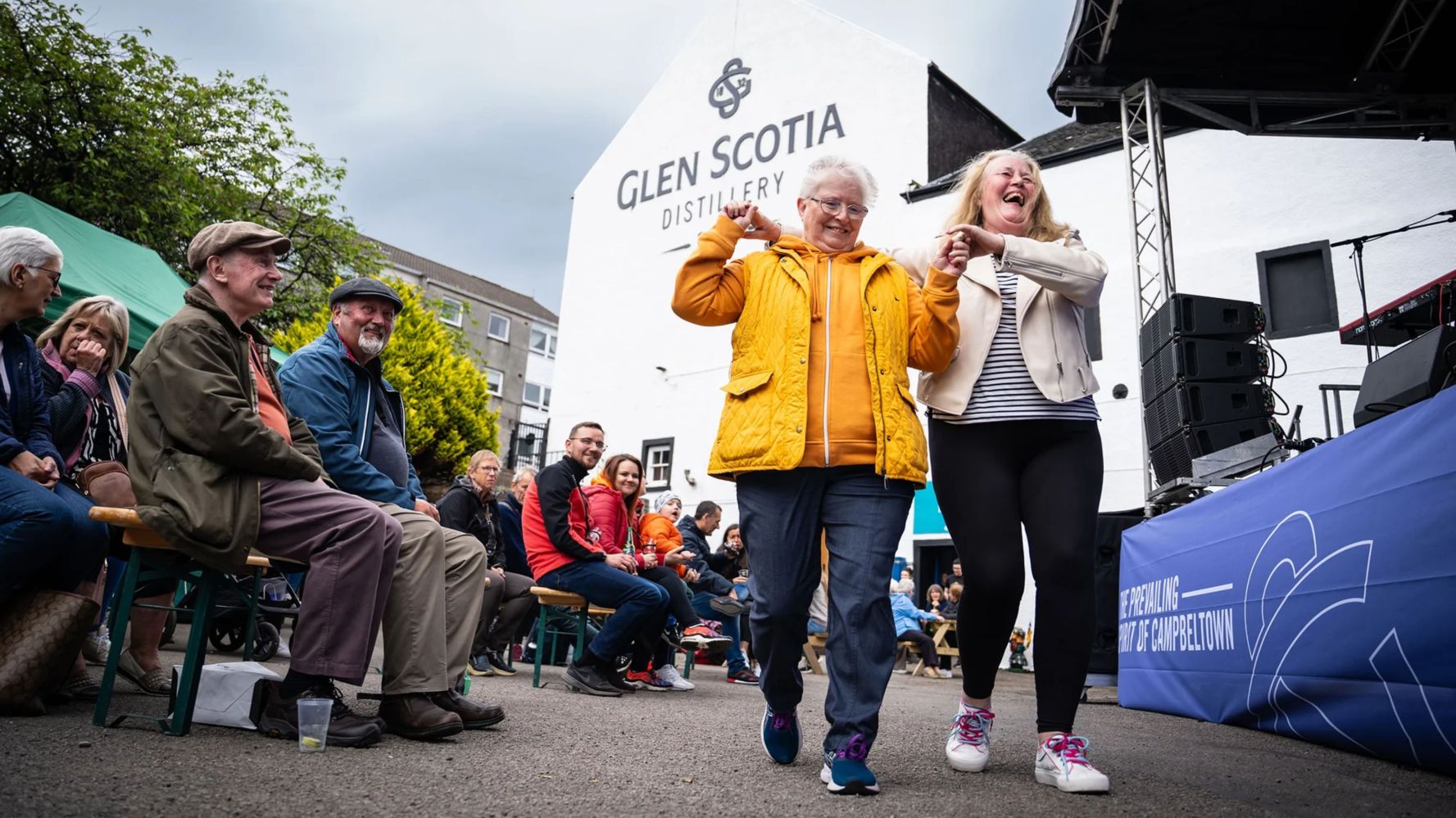 A group of people dancing at the Campbeltown whisky festival