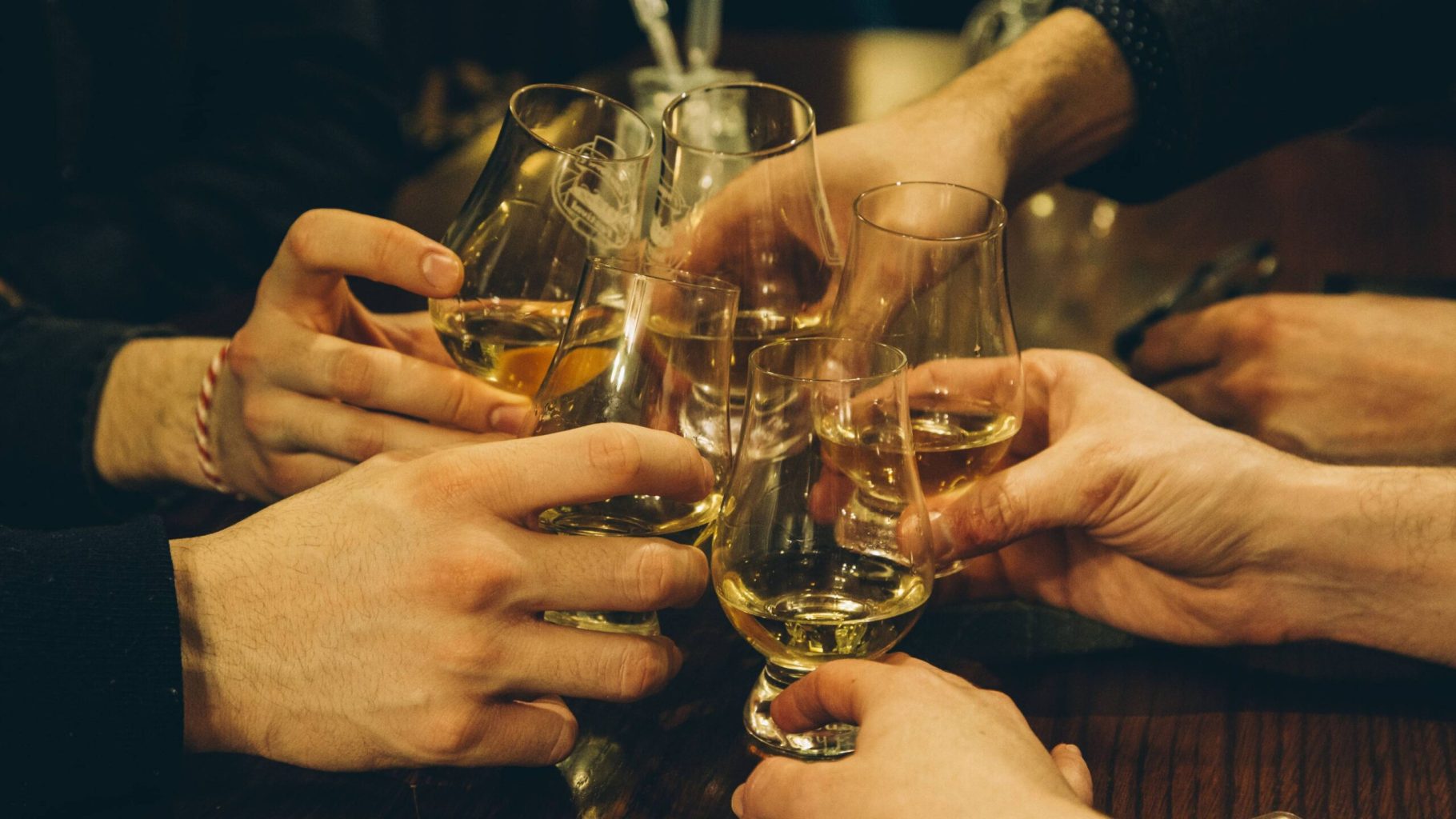 A group of friends enjoying a whisky tour in Scotland