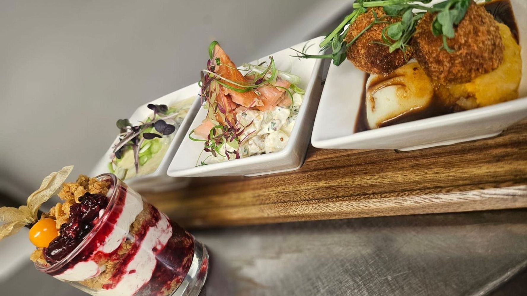 An intimate whisky tasting in Inverness featuring a Scottish platter with classic dishes.
