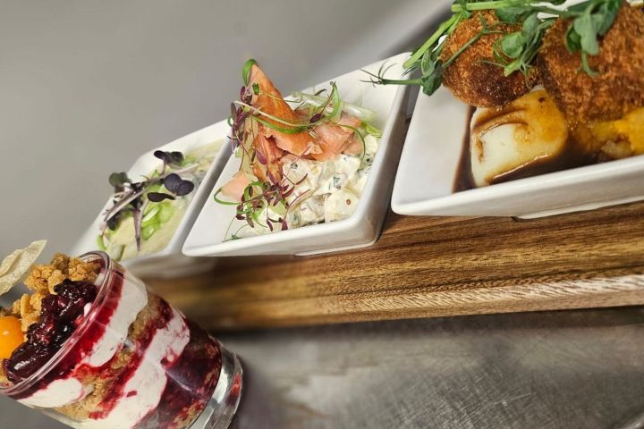 An intimate whisky tasting in Inverness featuring a Scottish platter with classic dishes.